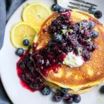 Lemon Ricotta Pancakes with Warm Berry Compote 103 Lemon-Ricotta-Pancakes-with-Warm-Berry-Compote-Recipe