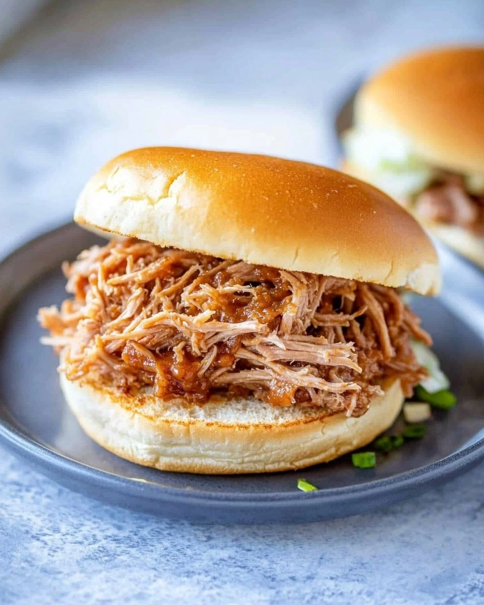 Slow-Cooker-Pulled-Pork-Tender-Shredded-Pork-Sandwiches-Recipe